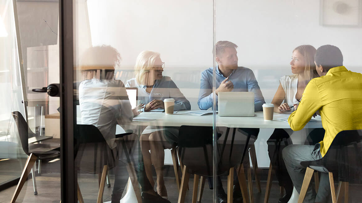 Colleagues meeting in a modern conference room